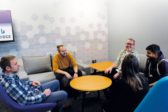 Group of people sitting around a table